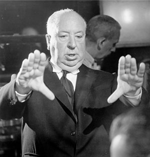 Alfred Hitchcock directs on set.